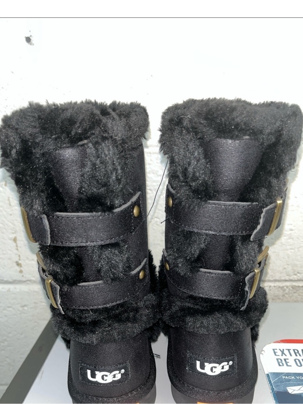 UGG Women’s Black Faux Fur Buckle Winter Boots